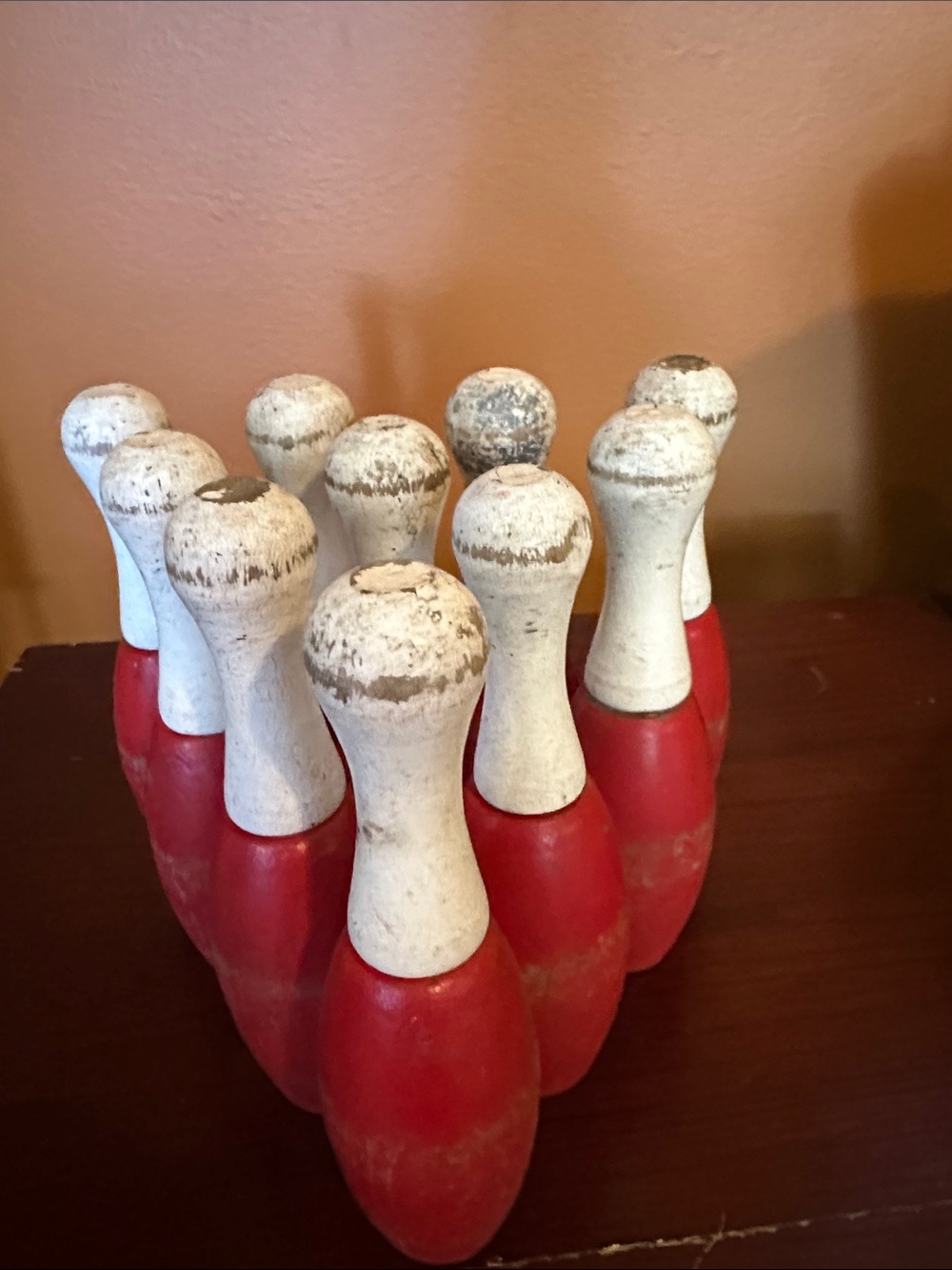 10 Small antique wooden bowling pins